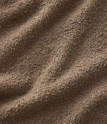 Brown, textured fabric with soft folds in the foreground and a consistent fuzzy pattern throughout the background. carousel Product Image 5