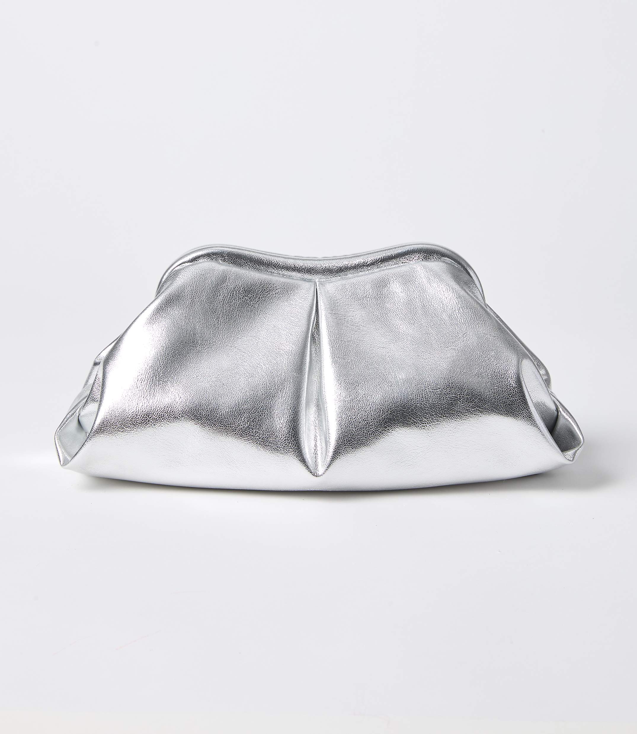 A silver metallic clutch bag with soft pleats sits on a plain white background.
