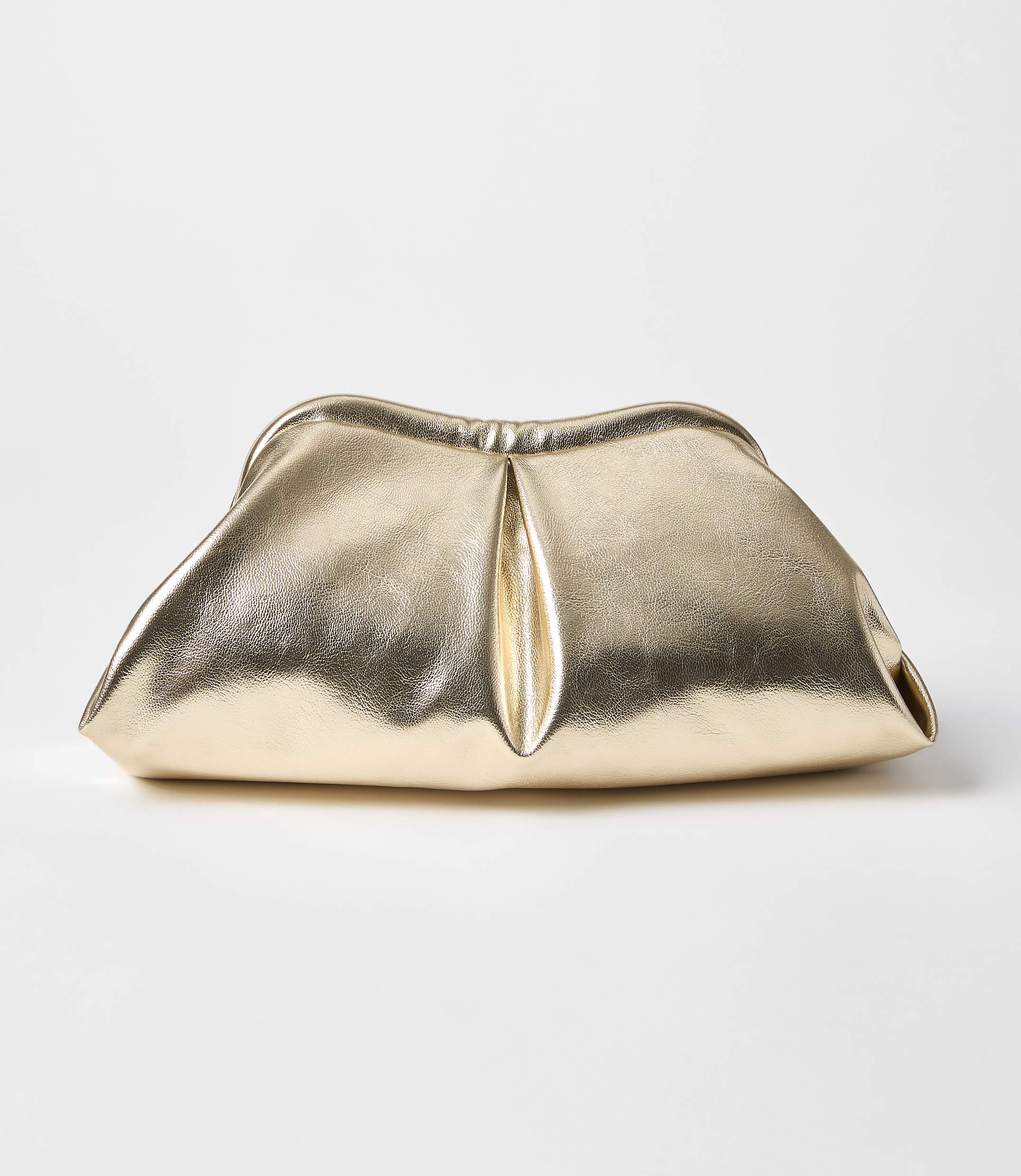 A metallic gold clutch bag with soft pleats sits on a plain white background.