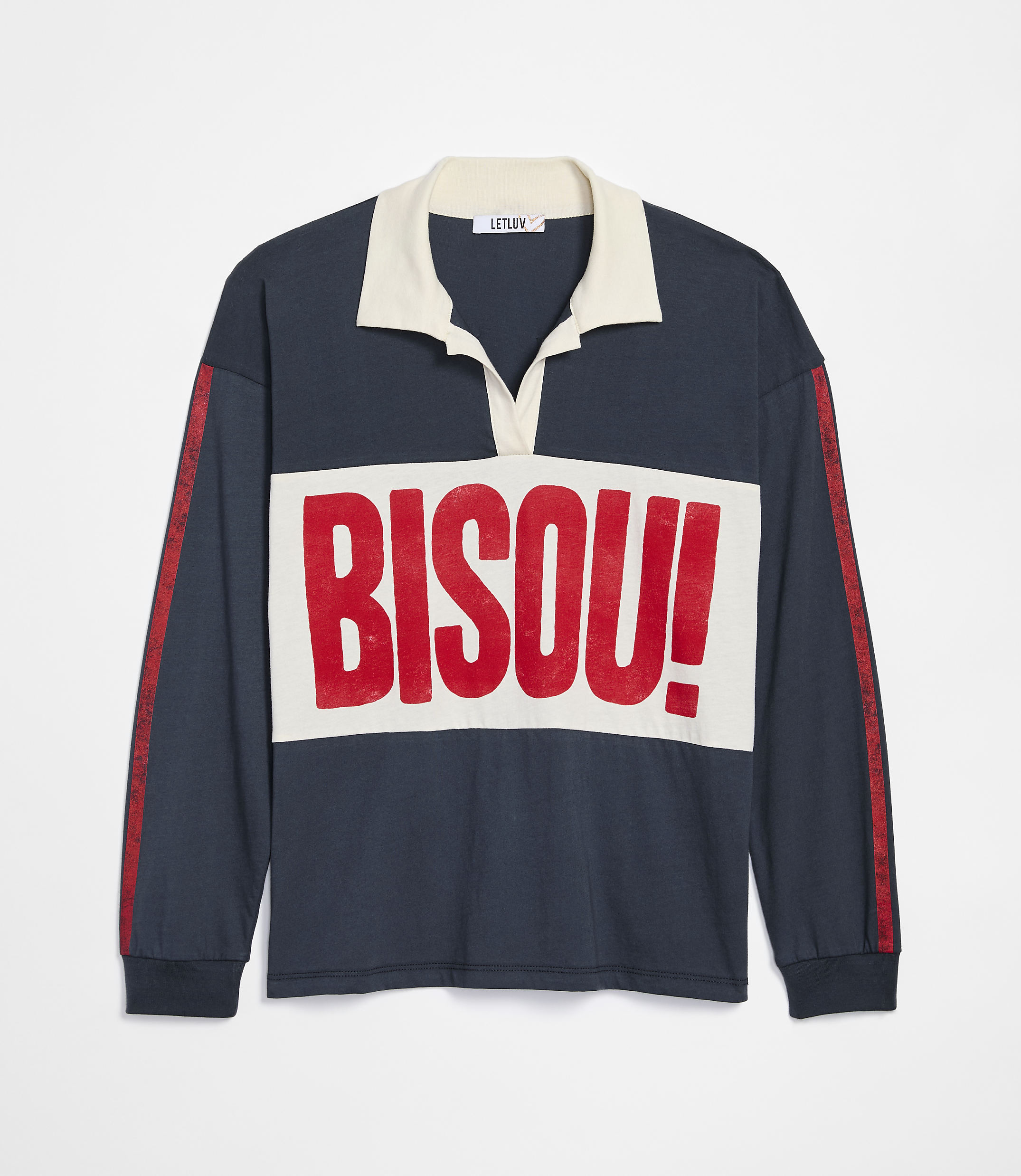A navy blue long-sleeved rugby shirt with a cream collar and a cream chest panel featuring the red text "BISOU!" is displayed against a plain white background.