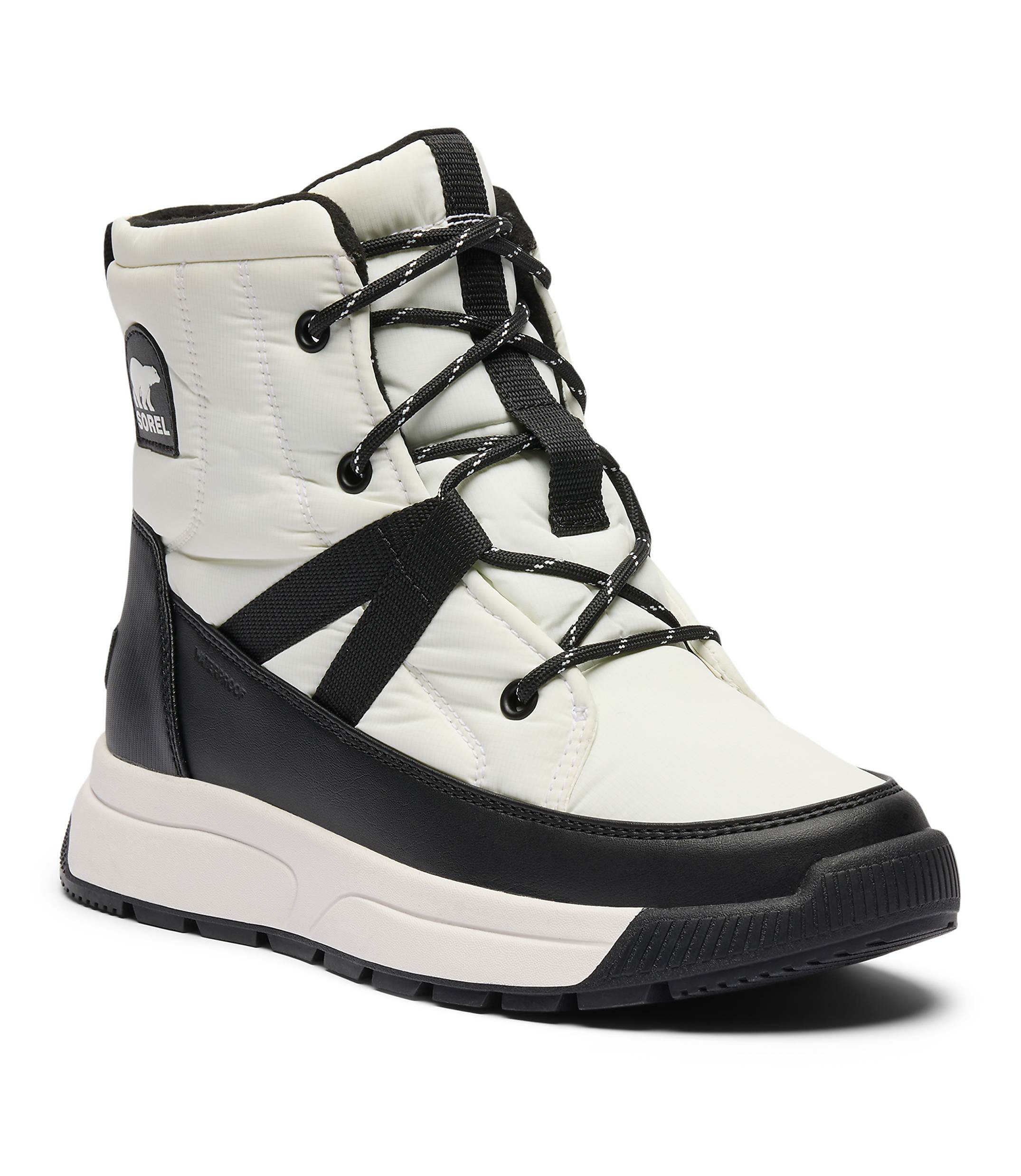 A white quilted winter boot with black accents and a thick sole stands against a plain white background.