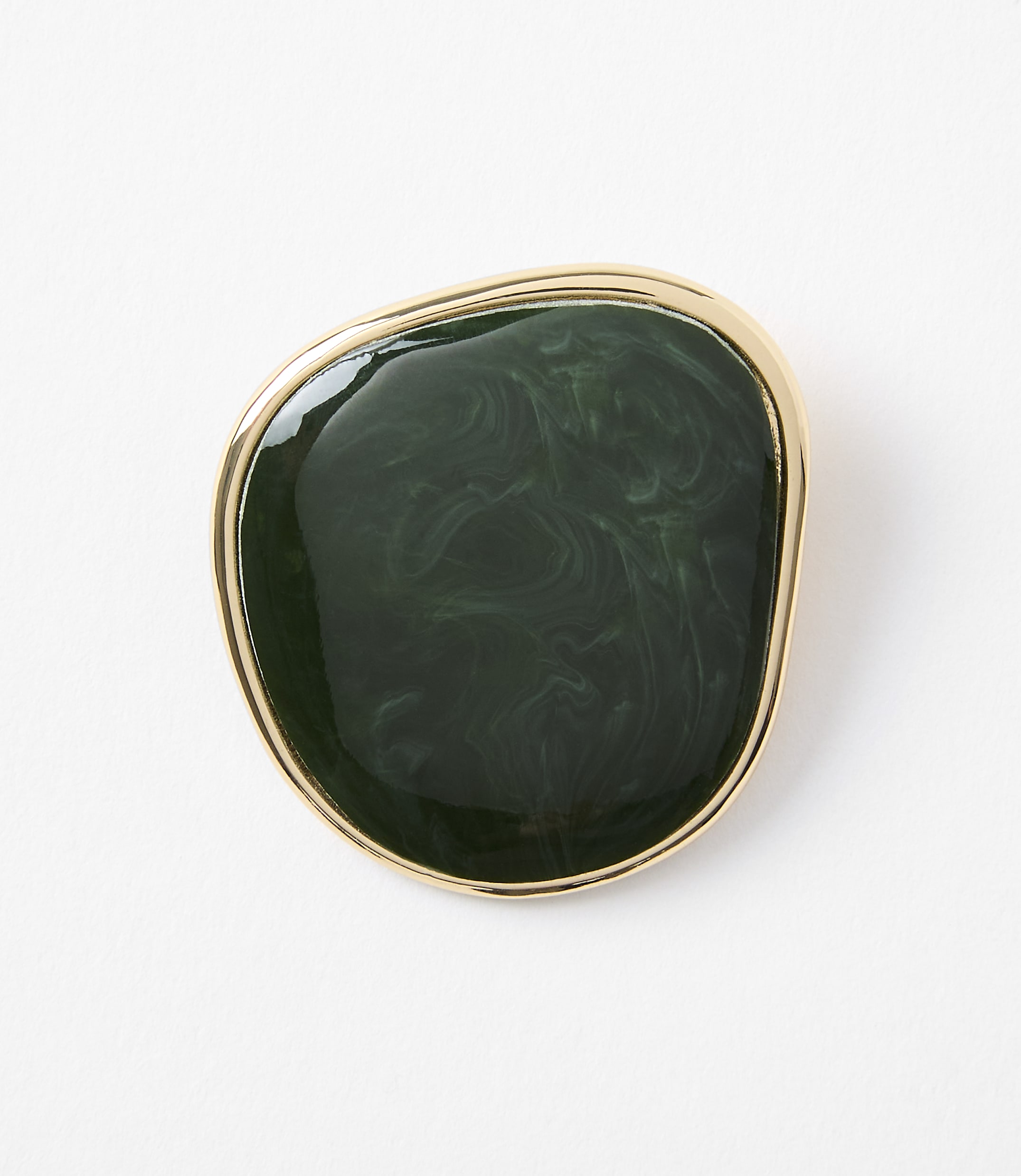 A dark green, marbled stone with a gold rim rests on a plain white background.