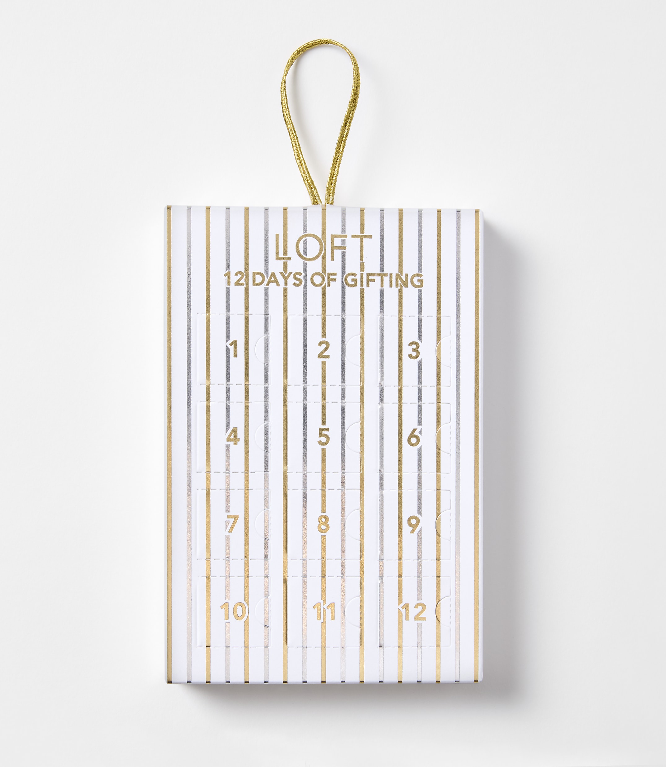A white and gold striped advent calendar with "LOFT 12 DAYS OF GIFTING" printed on the front hangs against a plain white background.