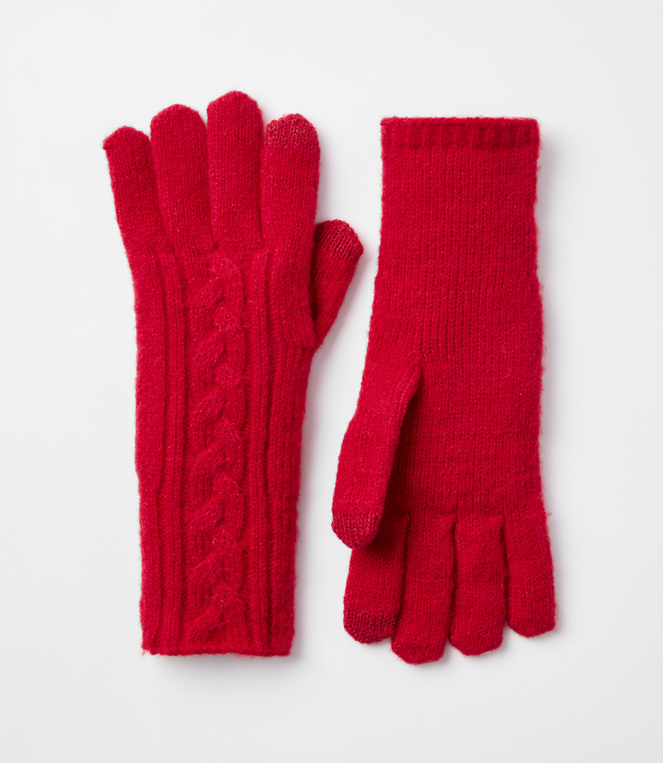 A pair of bright red cable-knit gloves rests on a plain white background.