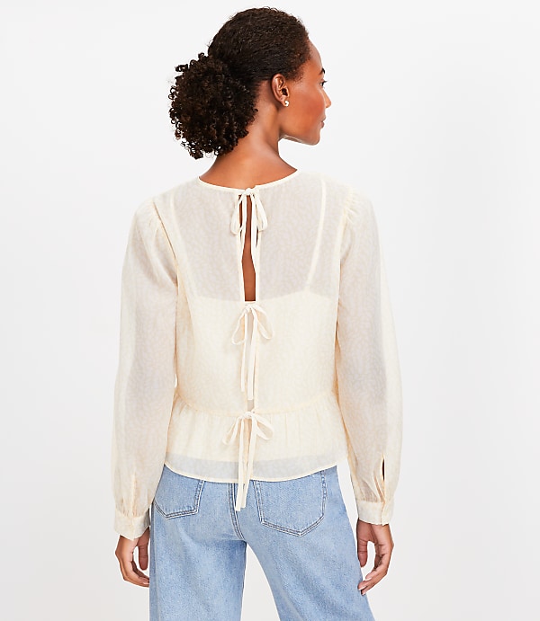 Feather Print Tie Back Peplum Blouse