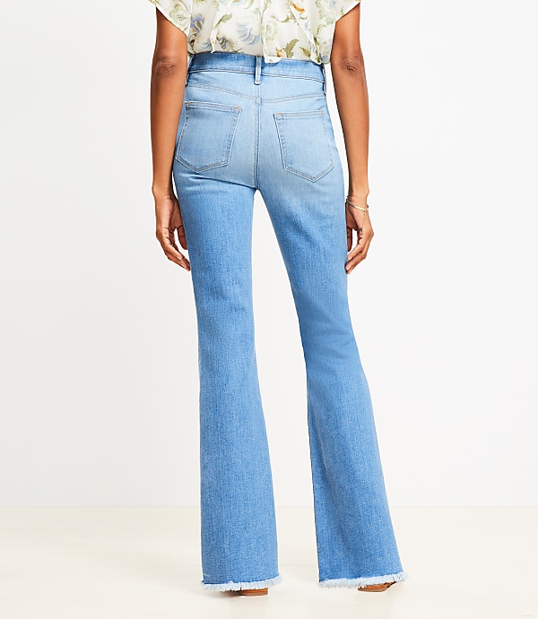 Frayed High Rise Slim Flare Jeans in Classic Mid Wash
