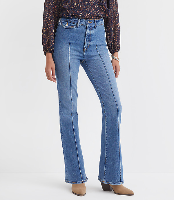 Petite Pintucked High Rise Slim Flare Jeans in Medium Stone Wash