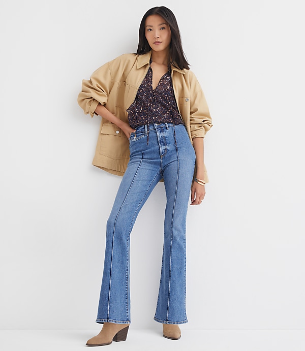 Petite Pintucked High Rise Slim Flare Jeans in Medium Stone Wash