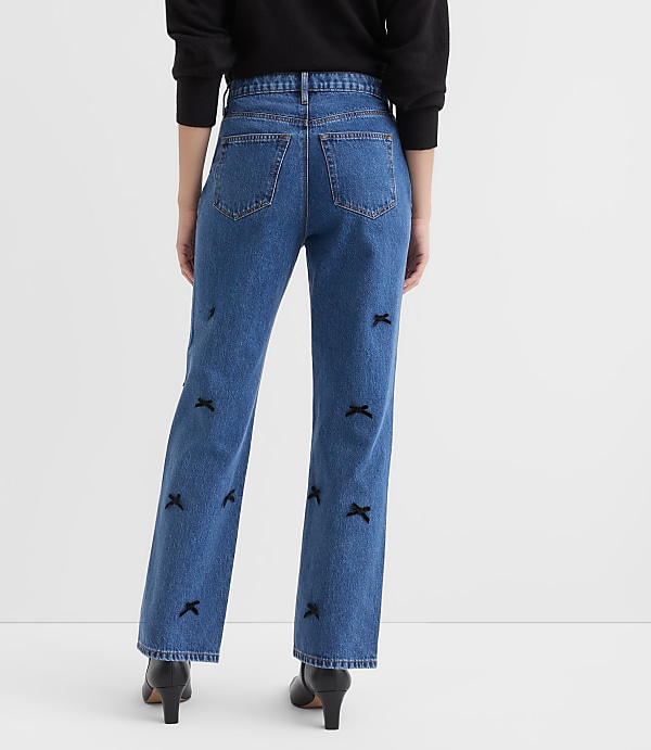 Petite Velvet Bow High Rise Straight Jeans in Bright Mid Indigo Wash