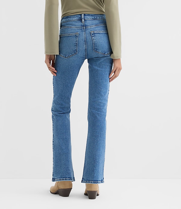 Rivete Curvy Mid Rise Boot Jeans in Vintage Mid Wash