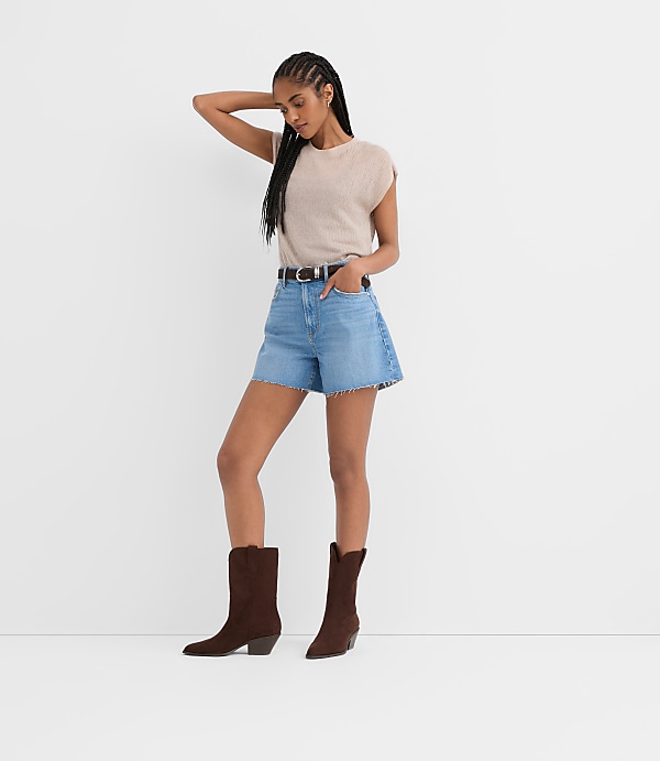 Rivete Petite High Rise Cut Off Denim Shorts in Mid Wash