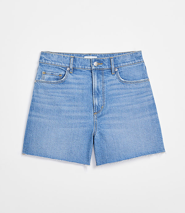 Rivete Petite High Rise Cut Off Denim Shorts in Mid Wash