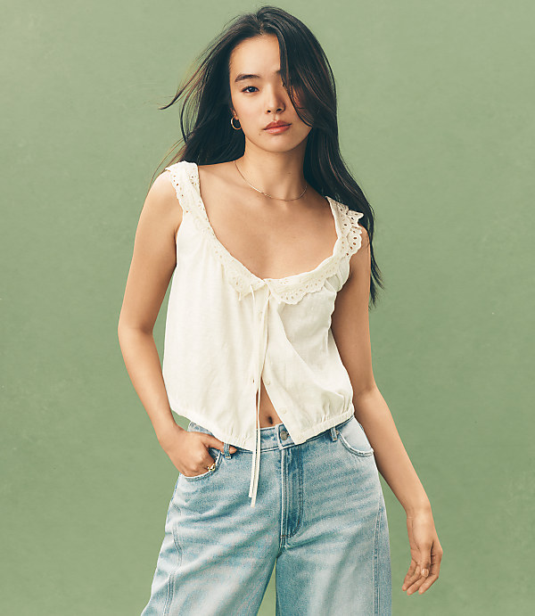 Eyelet Ruffle Tie Neck Button Top