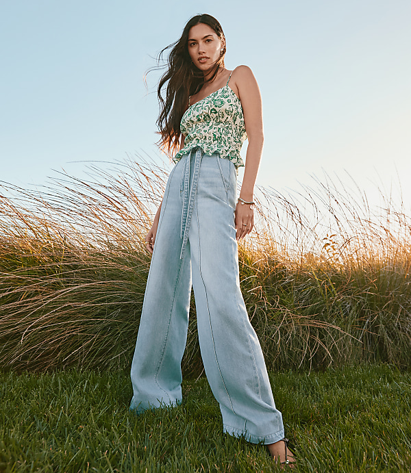Petite Tie Waist High Rise Palazzo Jeans in Light Wash