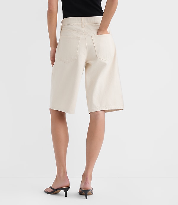 Rivete High Rise Denim Bermuda Shorts in Ivory