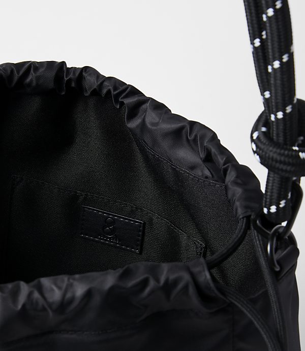 A black drawstring bag with a white-speckled rope strap is shown against a plain white background.