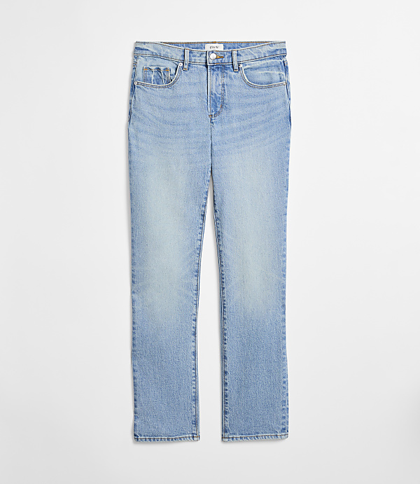 Light blue denim jeans are laid flat against a plain white background.