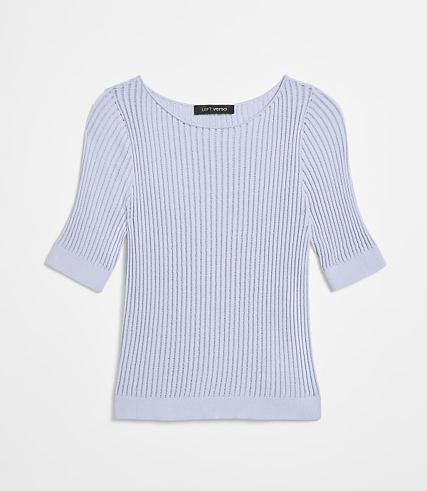A light blue ribbed knit sweater with short sleeves is laid flat against a plain white background.