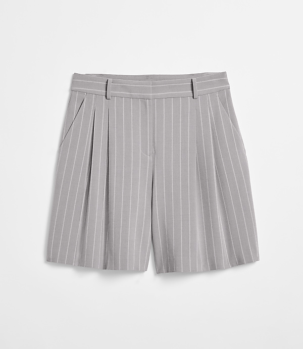 A pair of gray pinstripe shorts with pleats are laid flat against a plain white background.