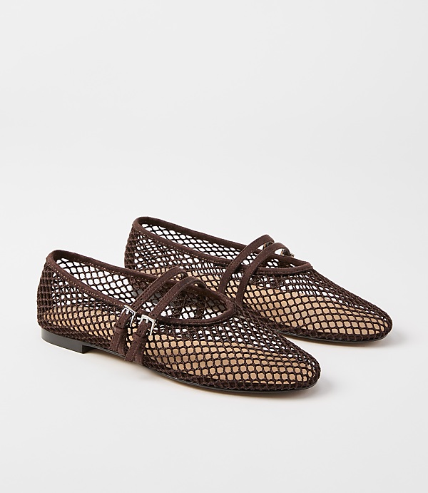 A pair of brown mesh ballet flats with ankle straps rests on a plain white background.