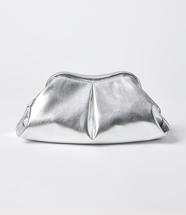 A silver metallic clutch bag with soft pleats sits on a plain white background.