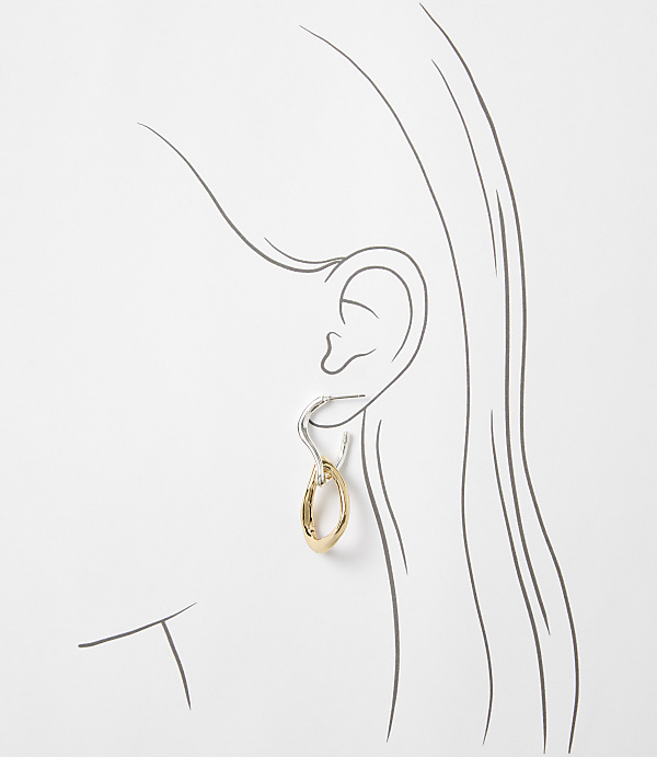 A gold and silver oval earring hangs from a sketched ear against a plain white background.
