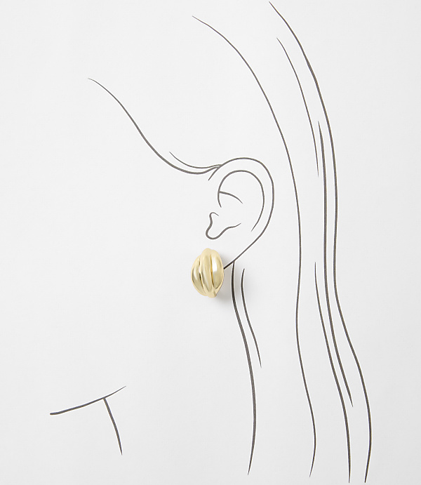 A gold oval earring with ribbed texture is worn on a sketched ear against a white background.