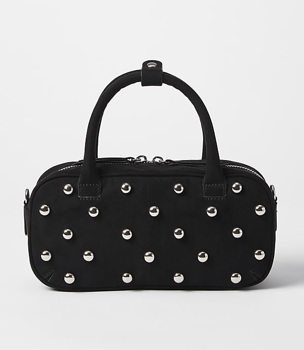 A black studded handbag with a white background.