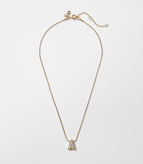 A gold necklace with an "A" pendant hangs against a plain white background.