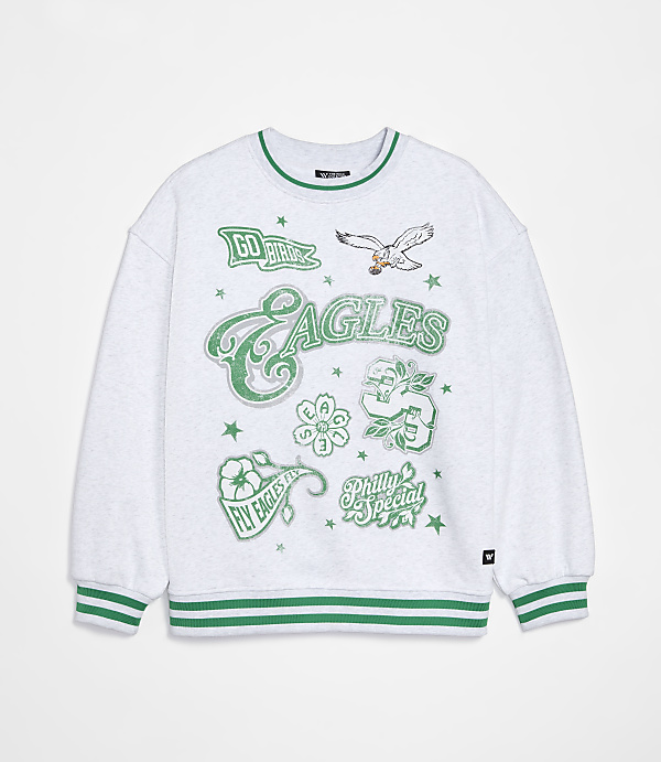 A white sweatshirt with green Eagles-themed graphics is displayed against a plain white background.