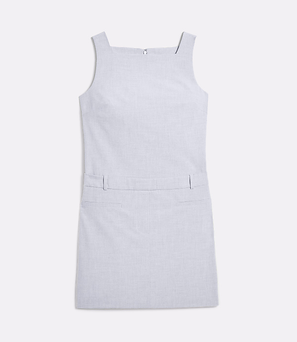 A light blue, sleeveless A-line dress with a square neckline and two front pockets is laid flat against a plain white background.