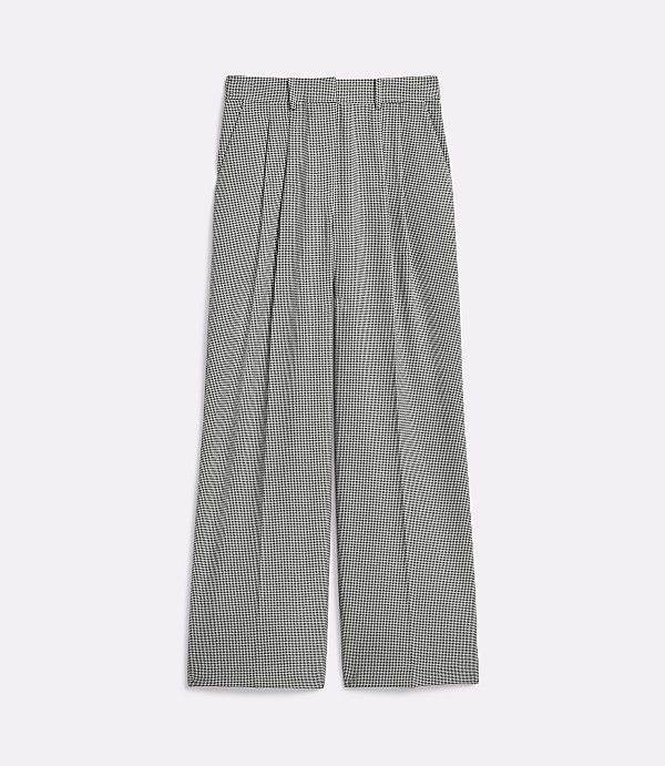 Pleated, wide-leg trousers with a subtle checkered pattern are laid flat against a plain white background.