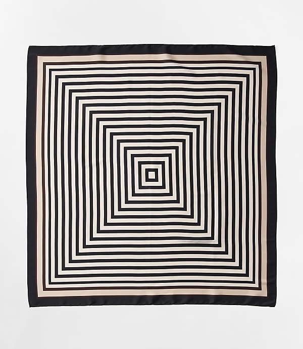 A square scarf with a concentric square pattern in black and white is laid flat against a plain white background.