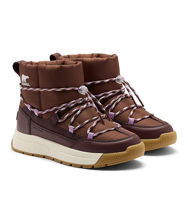 A pair of brown winter boots with purple and white laces are displayed against a plain white background.