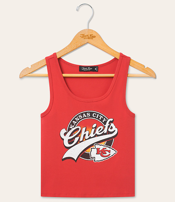 A red Kansas City Chiefs tank top hangs on a wooden hanger against a plain white background.