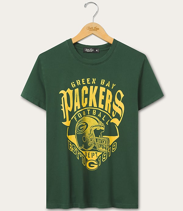 A green t-shirt with a yellow Green Bay Packers logo is displayed on a wooden hanger against a plain, light-colored background.