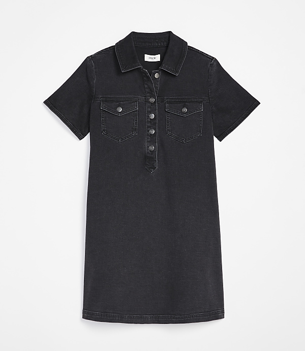 A dark wash denim shirtdress with button detailing and chest pockets is displayed against a plain white background.