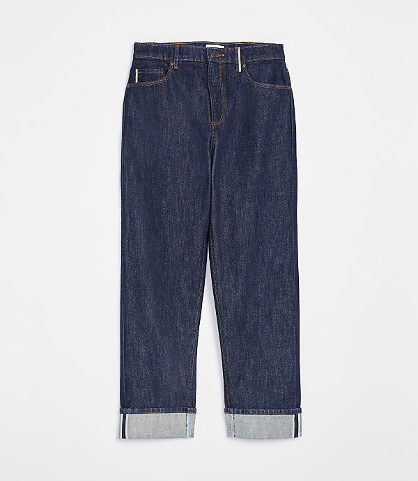 Dark wash denim jeans with cuffed hems are displayed against a plain white background.