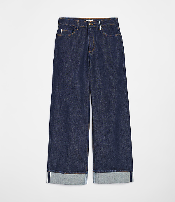 Dark wash denim jeans with cuffed hems are displayed against a plain white background.