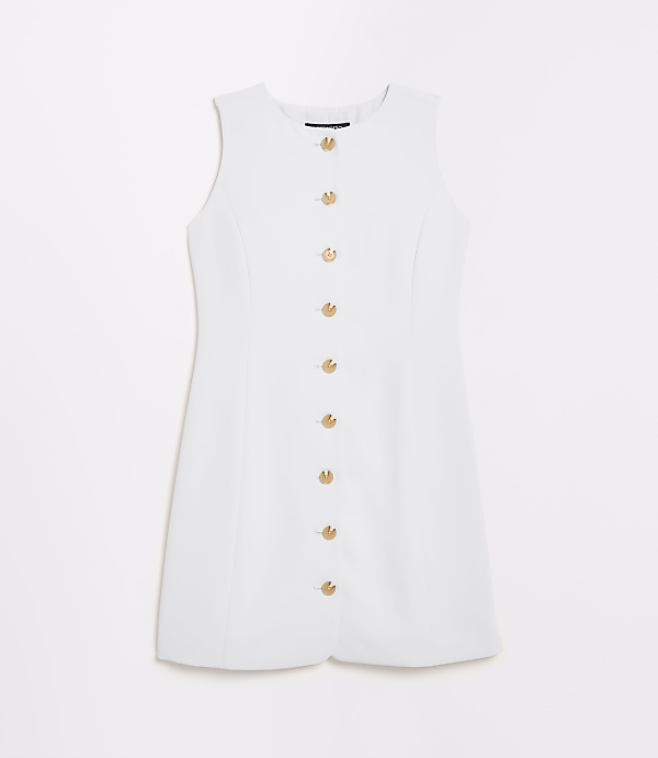 A sleeveless white dress with gold buttons down the front is laid flat against a plain white background.