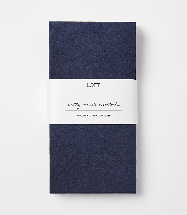 A folded pair of navy blue opaque control top tights with a white band in the middle featuring the "LOFT" logo and text, against a plain white background.