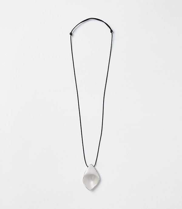 A translucent, teardrop-shaped pendant hangs from a thin black cord against a plain white background.