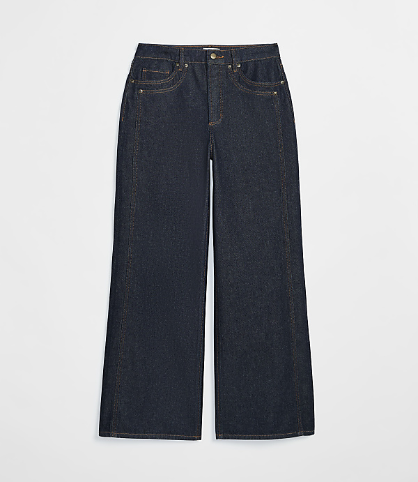Dark wash wide-leg jeans with visible stitching are presented against a plain white background.