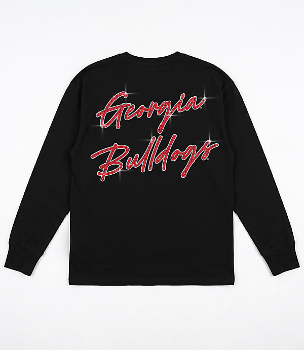 A black long-sleeved t-shirt with "Georgia Bulldogs" written in red glittery script is displayed against a white background.