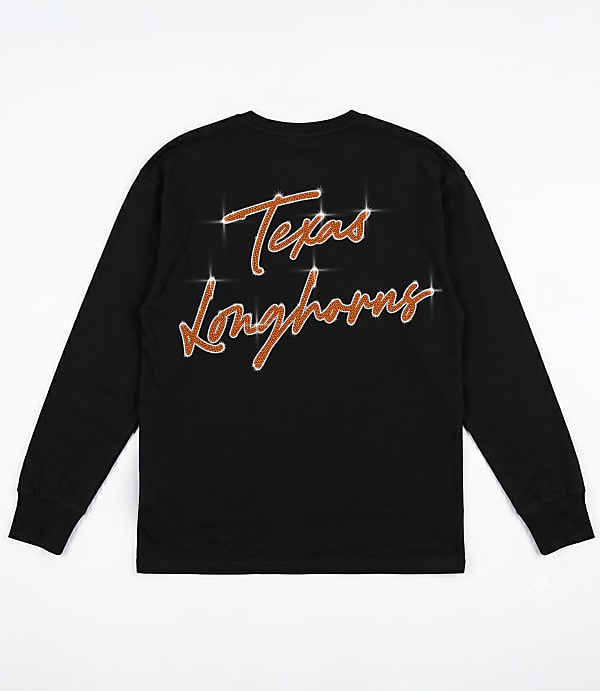 A black long-sleeved shirt with "Texas Longhorns" written in sparkly copper script is displayed against a plain white background.