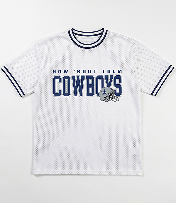 A white mesh t-shirt with navy blue trim and "HOW 'BOUT THEM COWBOYS" text with a Dallas Cowboys helmet logo is displayed against a plain white background.