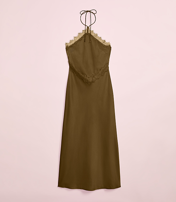 A brown slip dress with lace trim and a halter neck hangs against a soft pink background.