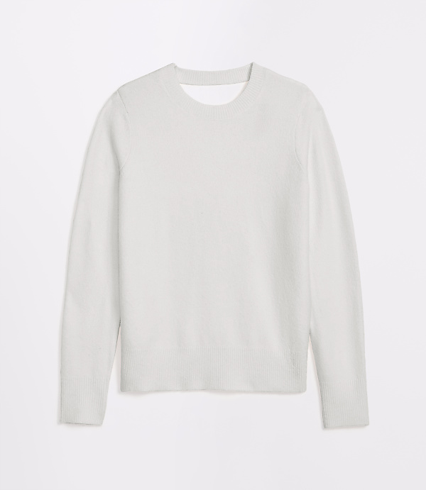 A light gray, long-sleeved sweater is laid flat against a plain white background.