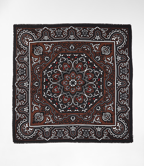 A square bandana with a detailed brown, black, and white paisley pattern is laid flat against a plain white background.