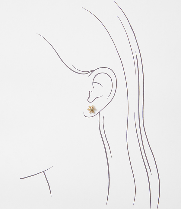 A delicate star-shaped earring adorns a stylized ear against a soft, sketched background of a head and flowing hair.